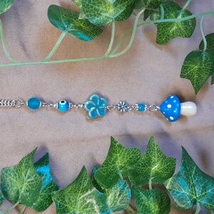 Mushroom rear view mirror hanger